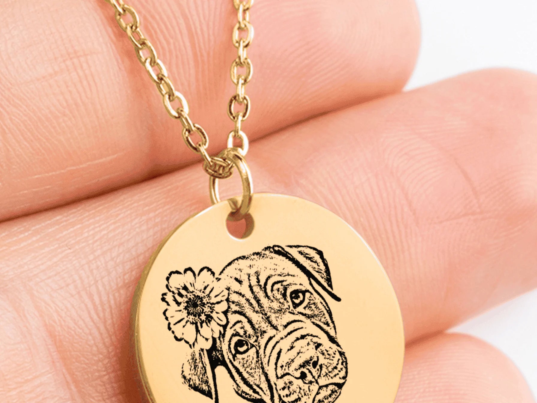 Close-up of engraved jewelry details in soft daylight